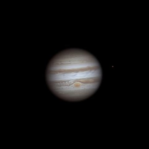 photo of jupiter and its moon io