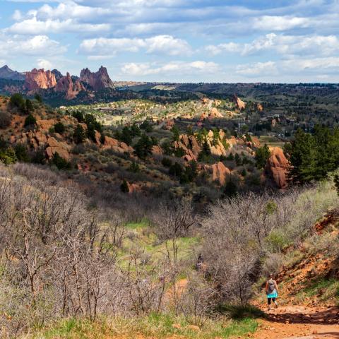 photo of a person hiking on a trail